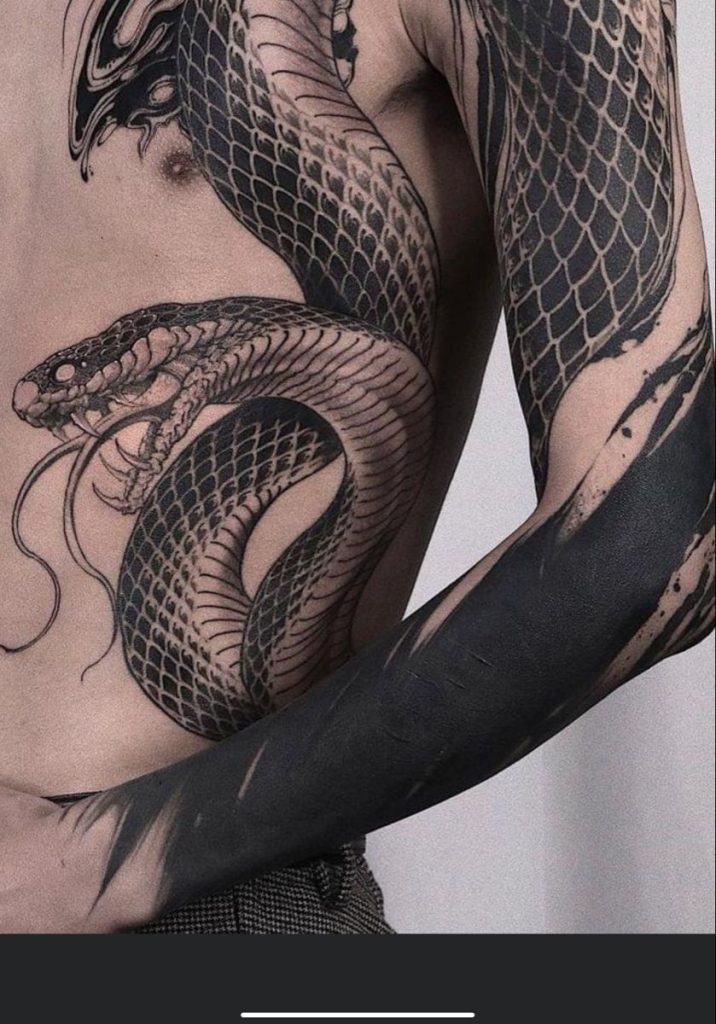 blackwork snake sleeve and chest