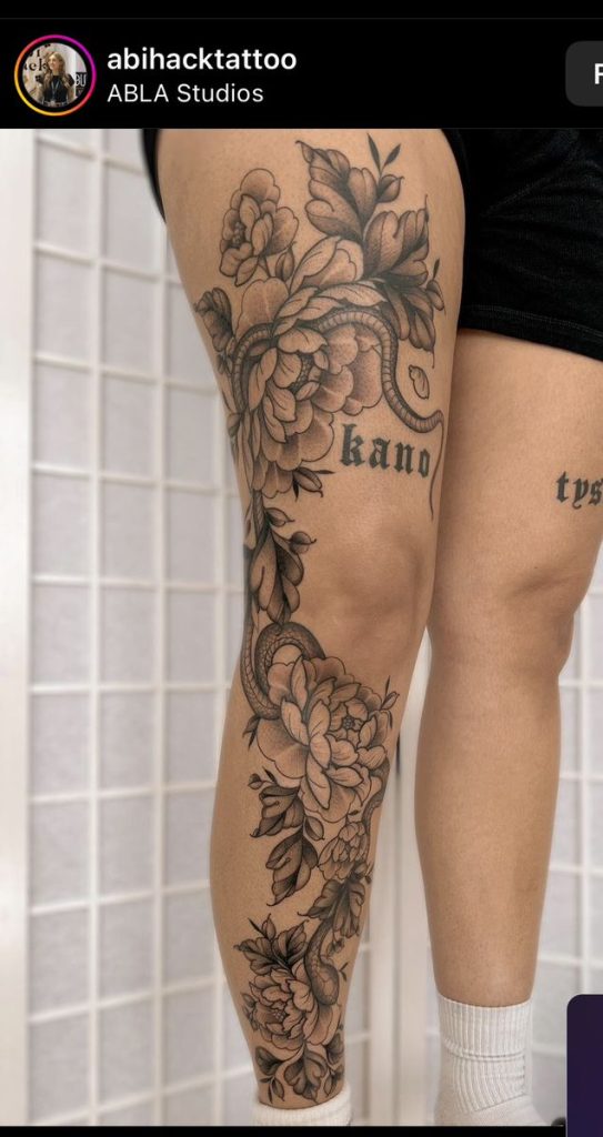 leg snake floral blackwork tattoo