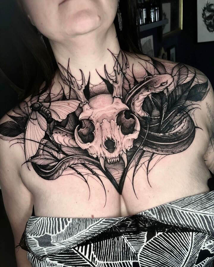 animal skull chest tattoo