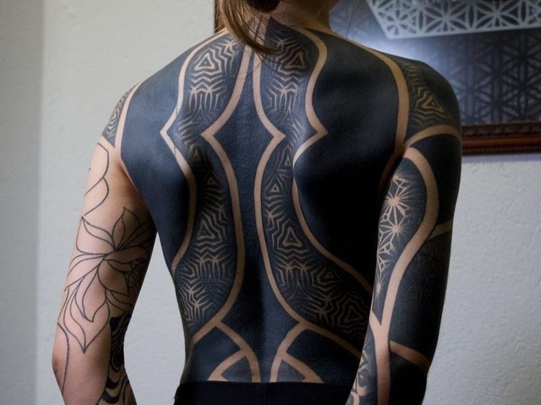 black tattoo sleeve and back