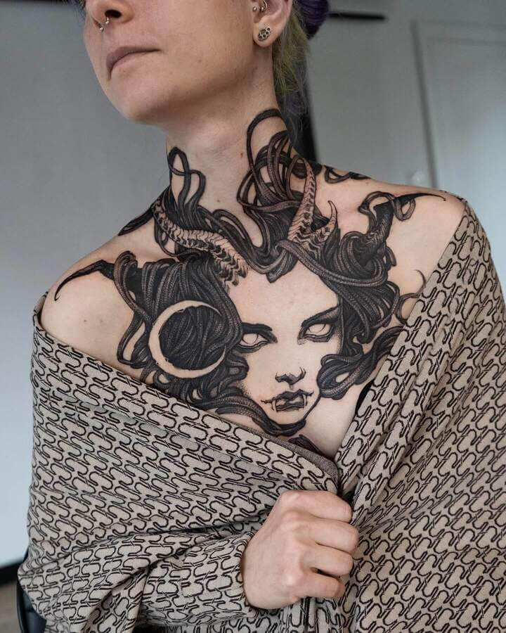 demon girl chest tattoo