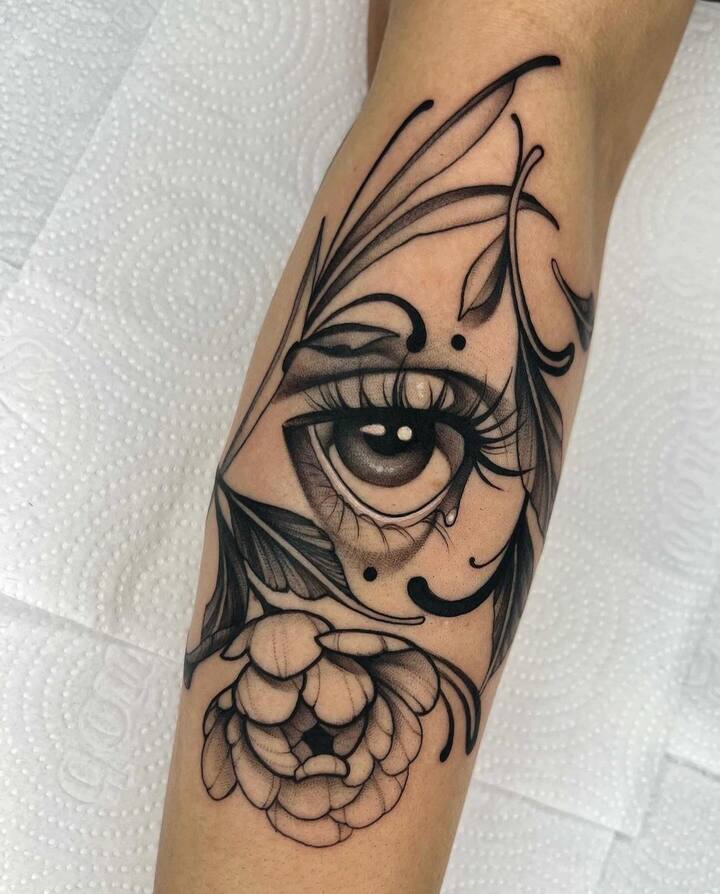 eye floral tattoo