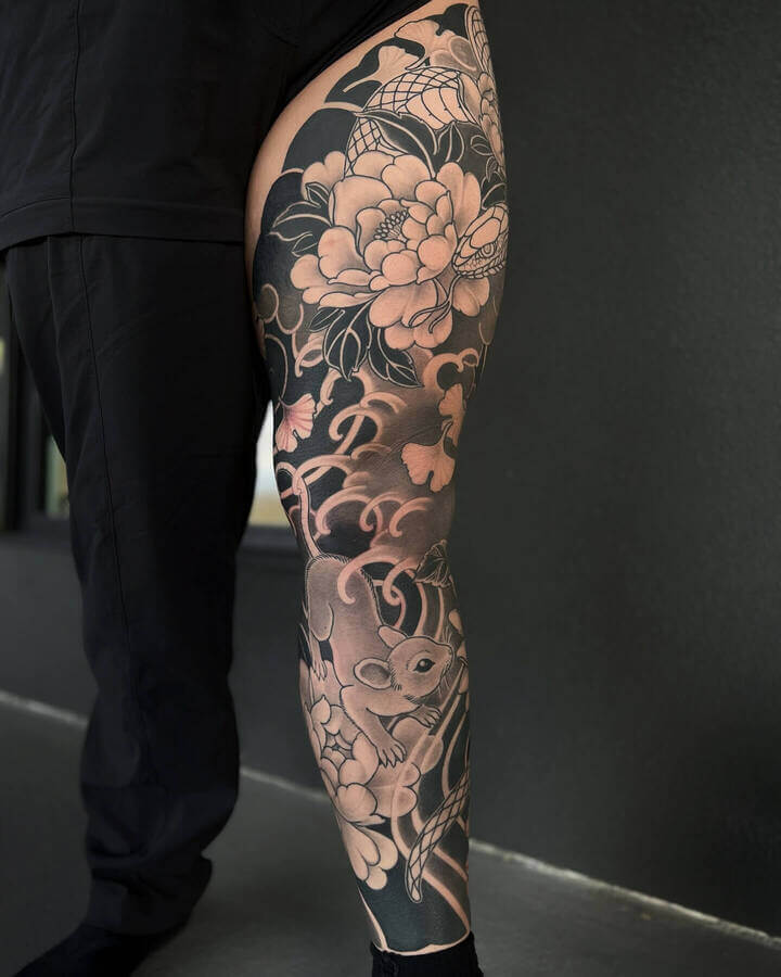 floral leg tattoo