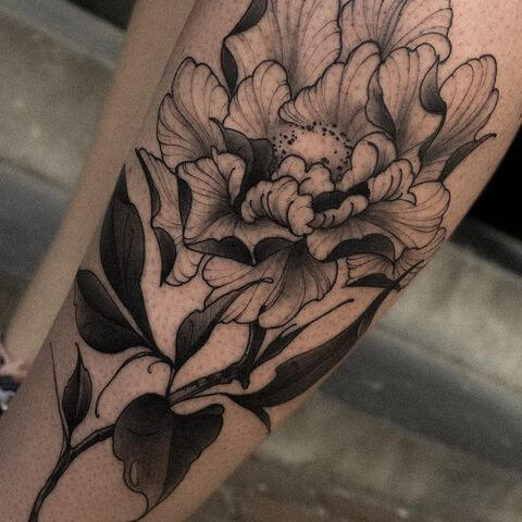 floral leg tattoo