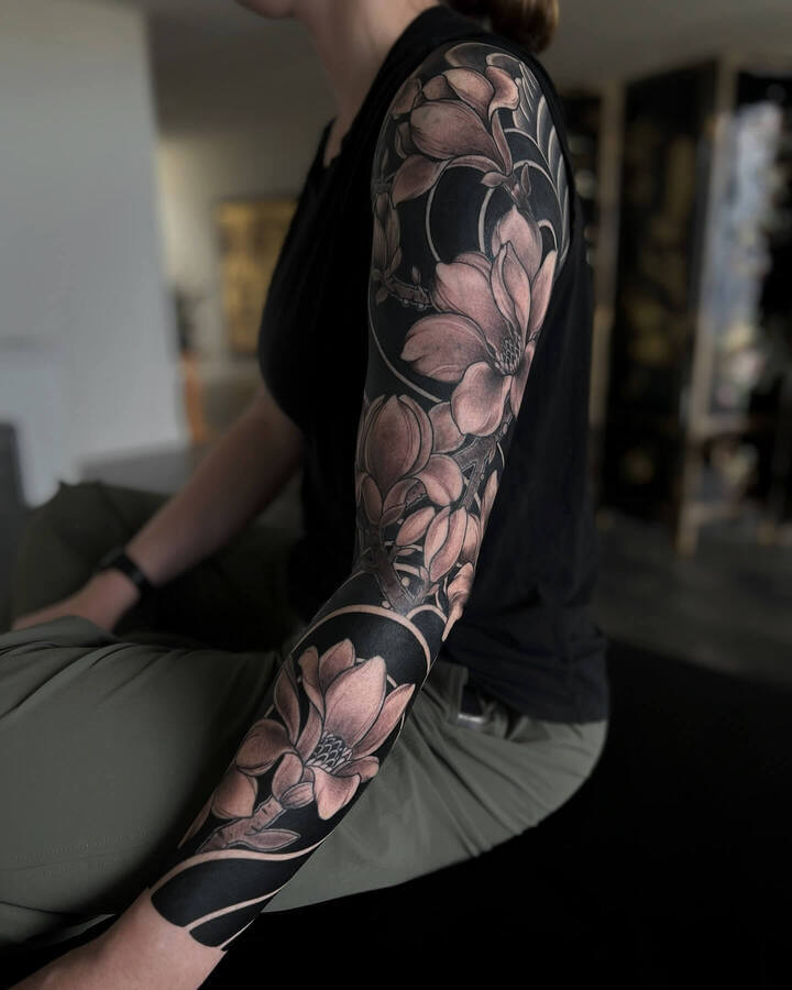 floral sleeve tattoo