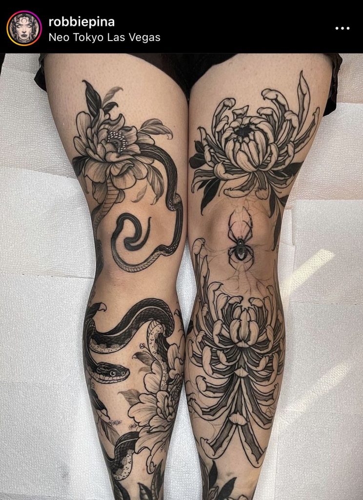 floral snake spider tattoo