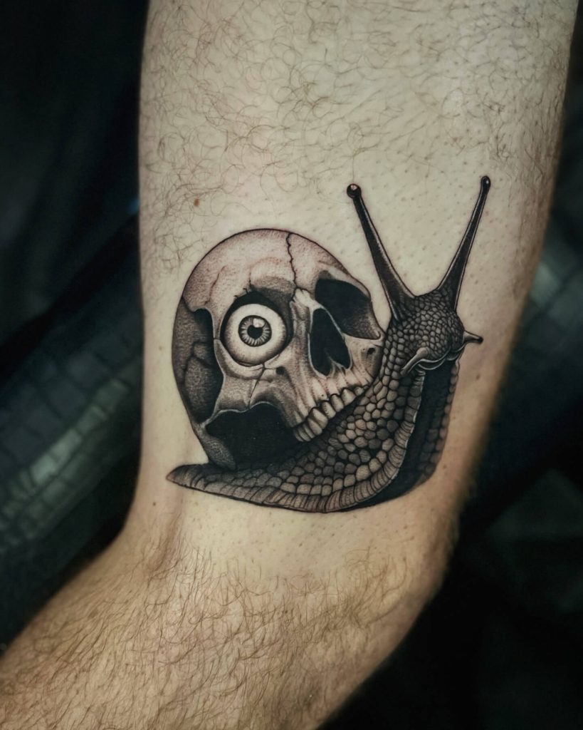 Snail skull tattoo