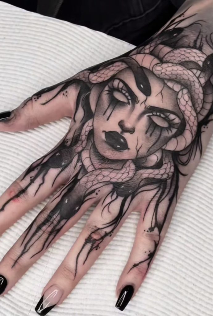 hand medusa gargona blackwork tattoo